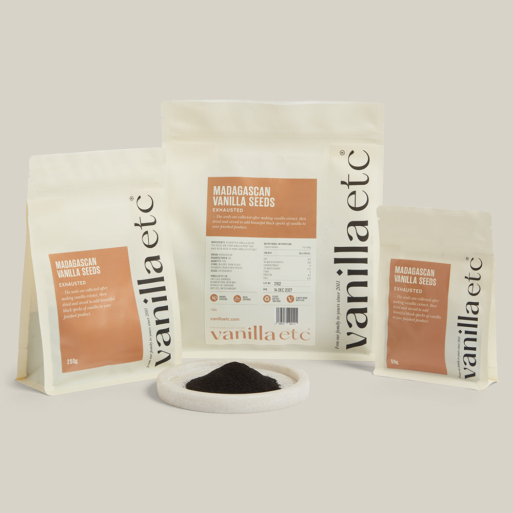 vanilla etc packaging with vanilla seeds on a light background