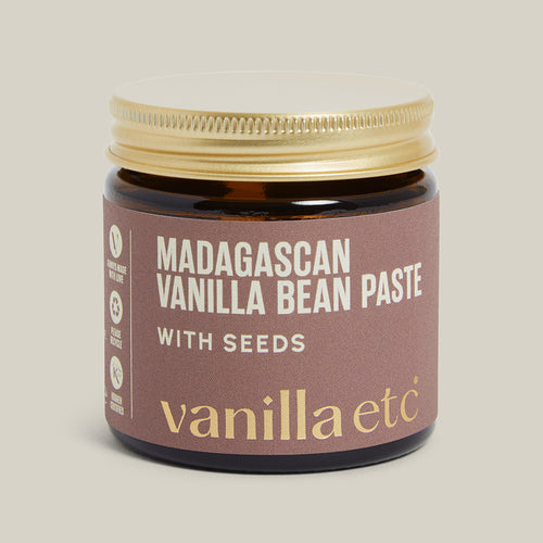 Jar of Madagascan Vanilla Bean Paste with Seeds by vanilla etc on a cream background