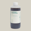 1 litre bottle of Madagascan vanilla extract on a cream background
