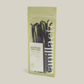 Packaging of Madagascan vanilla pods on a light beige background