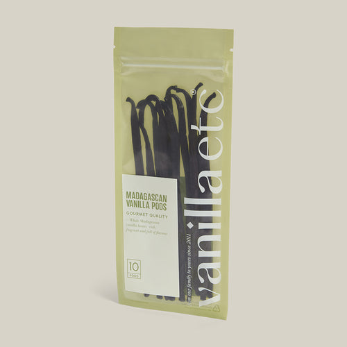 Packaging of Madagascan vanilla pods on a light beige background