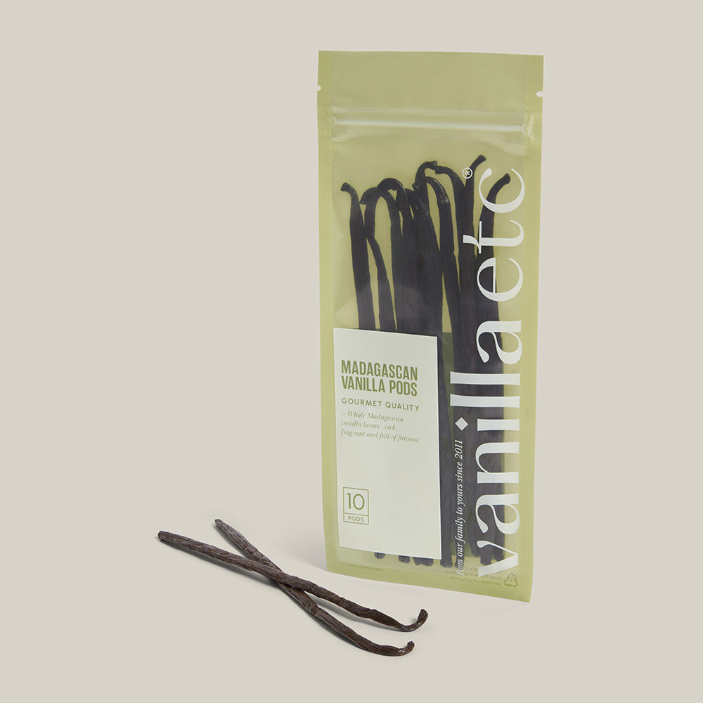 Vanilla pods in packaging on a light background